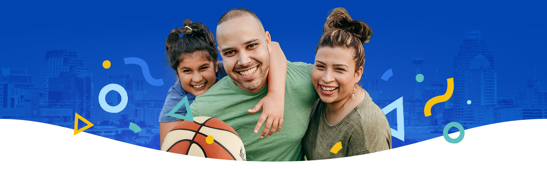 Family in front of skyline with basketball