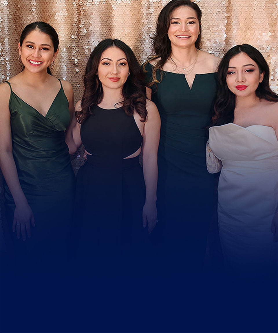 Four women in gala attire
